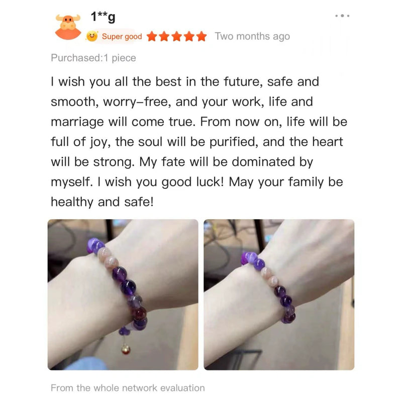 Handcrafted natural crystal bracelet with purple and pink stones worn on a wrist.