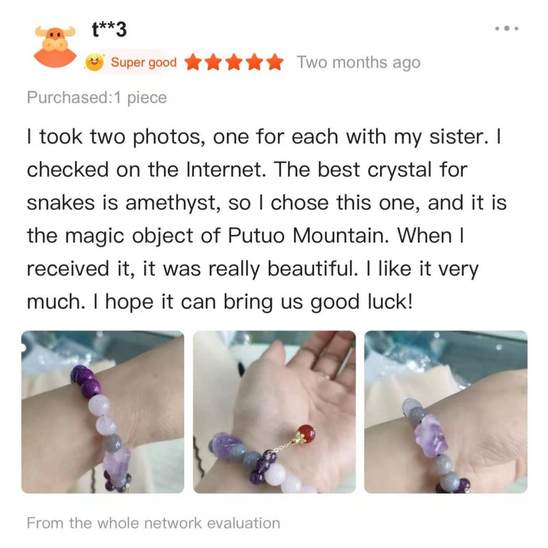 Handcrafted amethyst and natural stone crystal bracelet worn on a wrist.