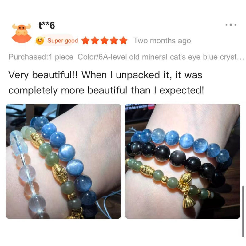 Handcrafted blue cat's eye crystal bead bracelets with gold Buddha and bell charms.