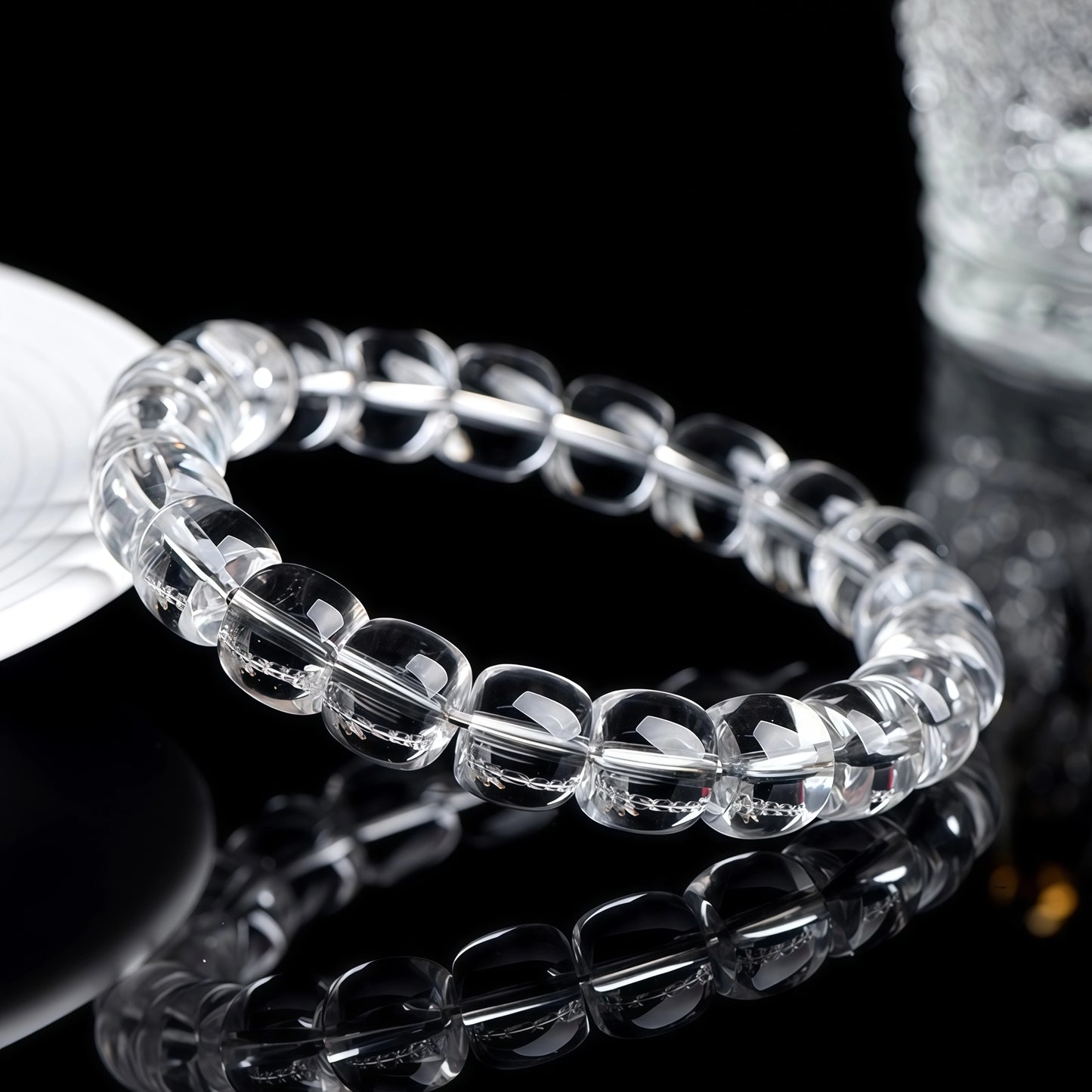 Natural clear quartz bracelet shown from another angle, showing its transparency