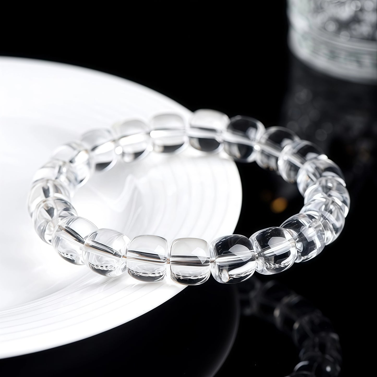 Close-up of natural clear quartz beads with fine internal textures and inclusions