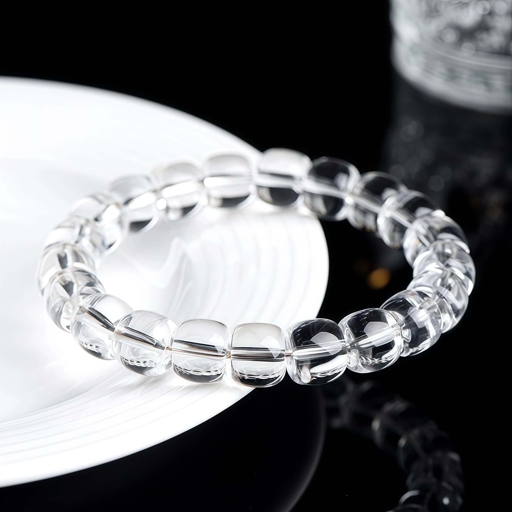 Close-up of natural clear quartz beads with fine internal textures and inclusions