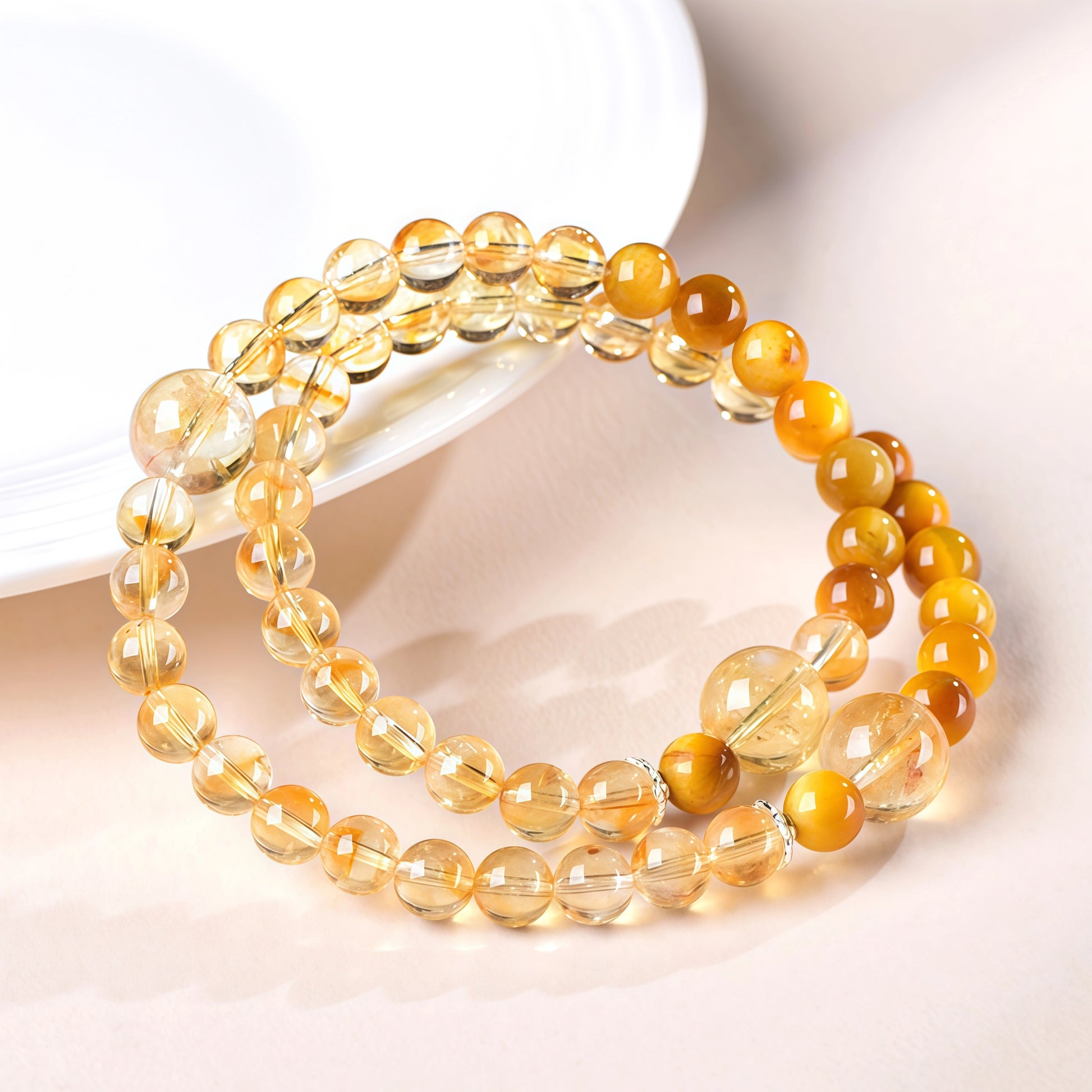 Natural citrine bracelet double-wrapped on a woman's wrist, 6mm beads with a 10mm focal stone