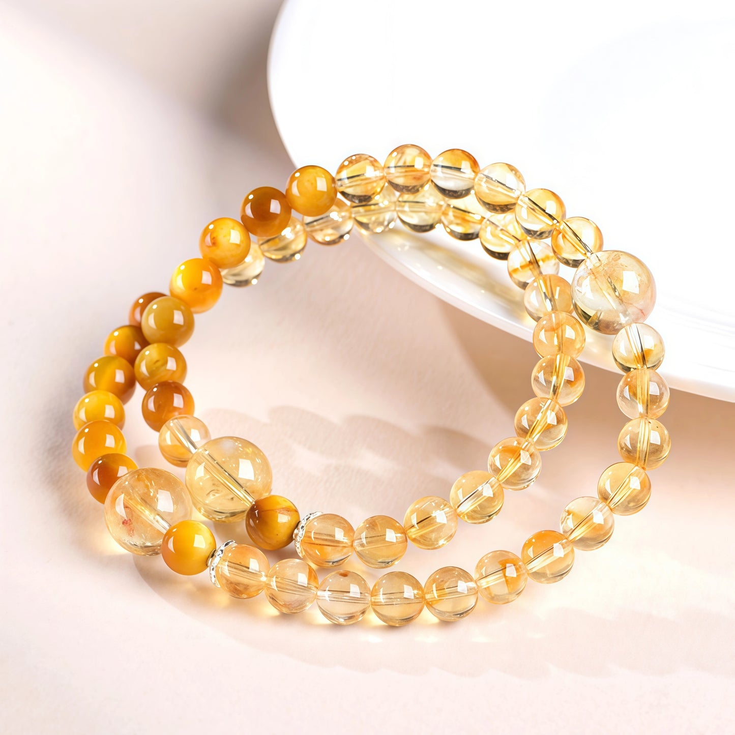 Close-up of natural citrine beads showing golden colour, clarity and natural inclusions