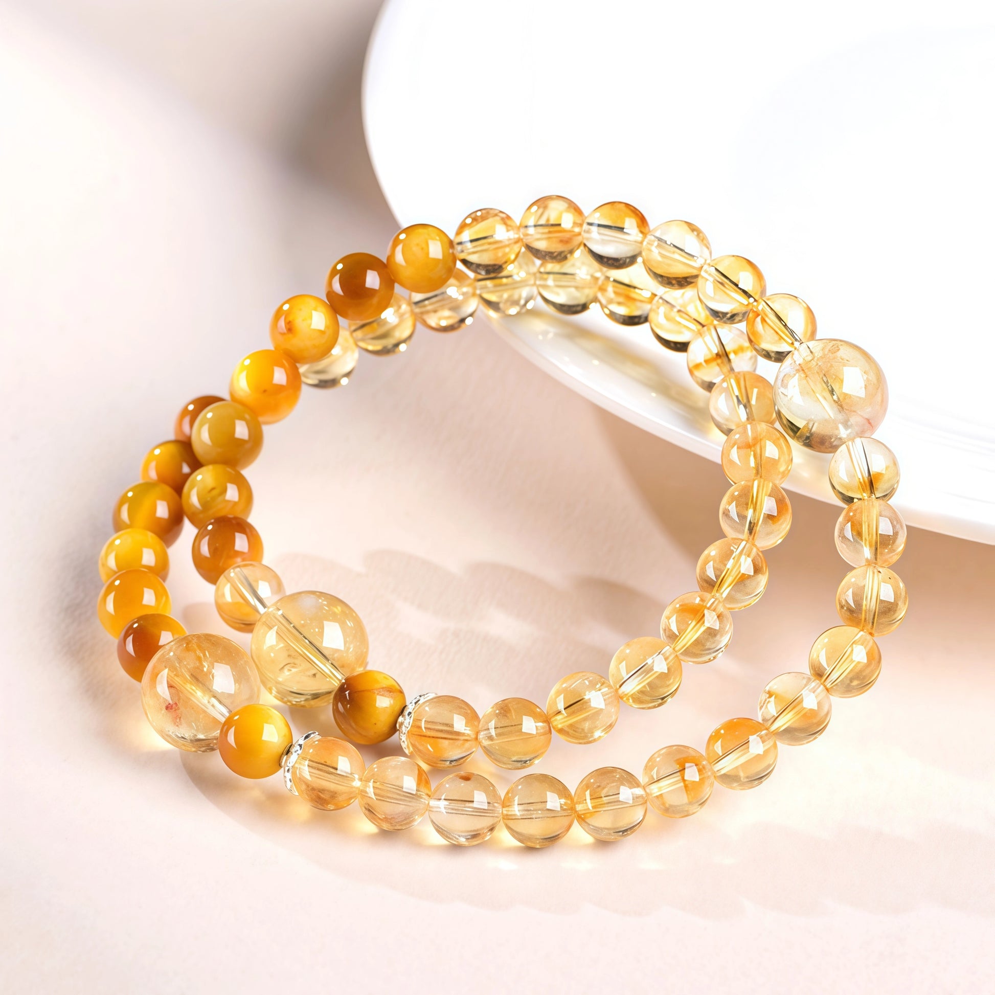 Close-up of natural citrine beads showing golden colour, clarity and natural inclusions