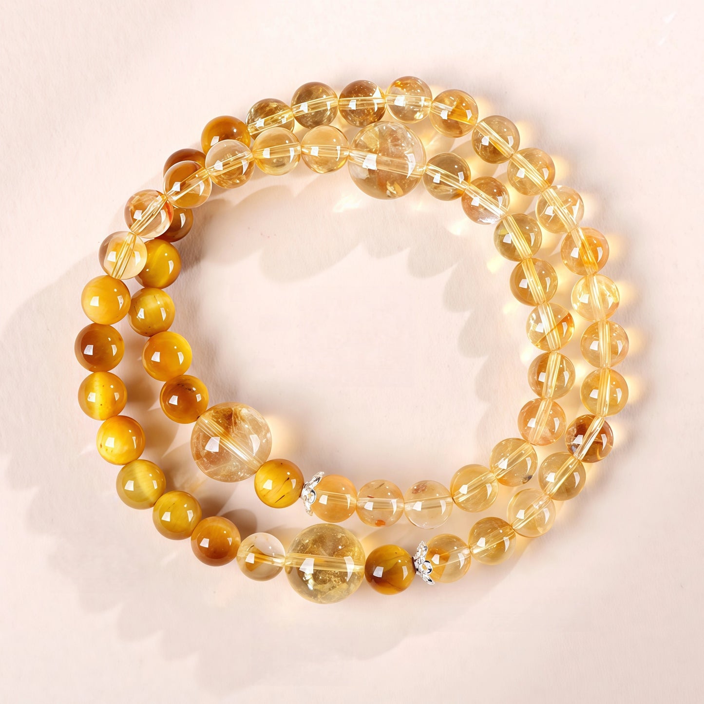 Golden Years citrine bracelet specifications: 6mm and 10mm beads, elastic double wrap