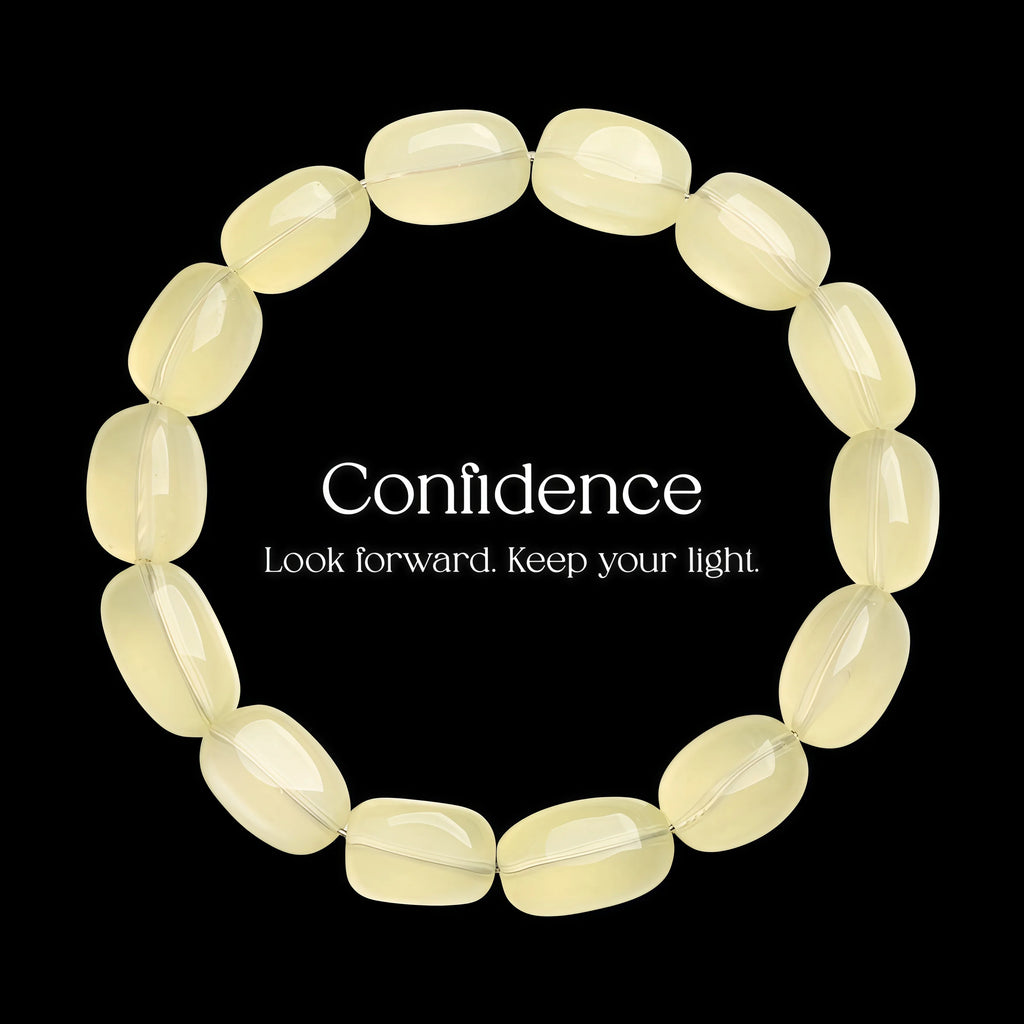 Handcrafted pale yellow natural crystal bead bracelet on a black background with text.