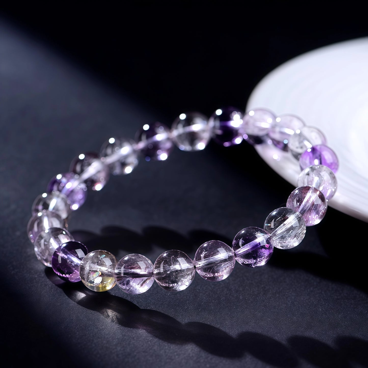 Close-up of translucent Super Seven quartz beads with natural rutile and amethyst inclusions